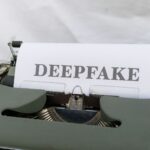 a close up of a typewriter with a paper on it