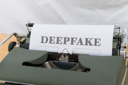 a close up of a typewriter with a paper on it