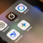 Smartphone screen displays ai app icons: chatgpt, grok, meta ai, gemini.