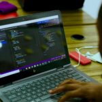 black HP laptop displaying C++ language